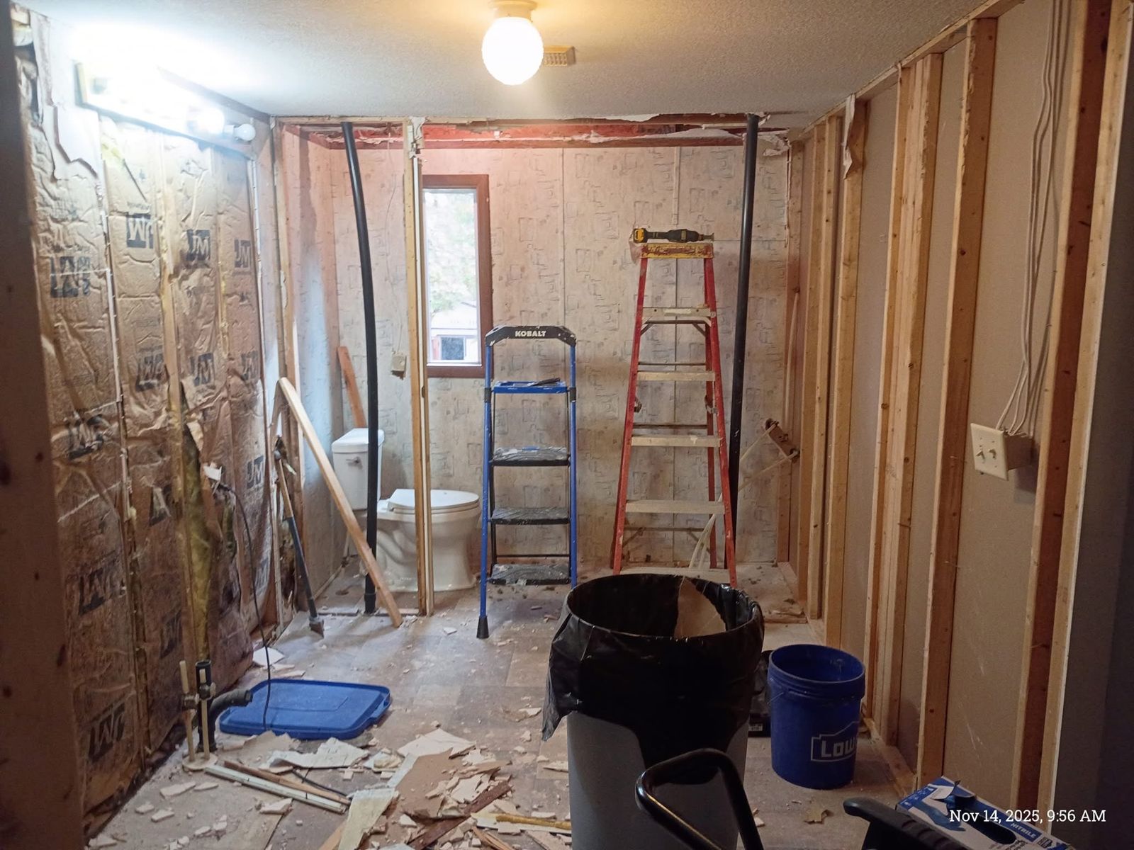 Bathroom gutted down to the studs during demolition