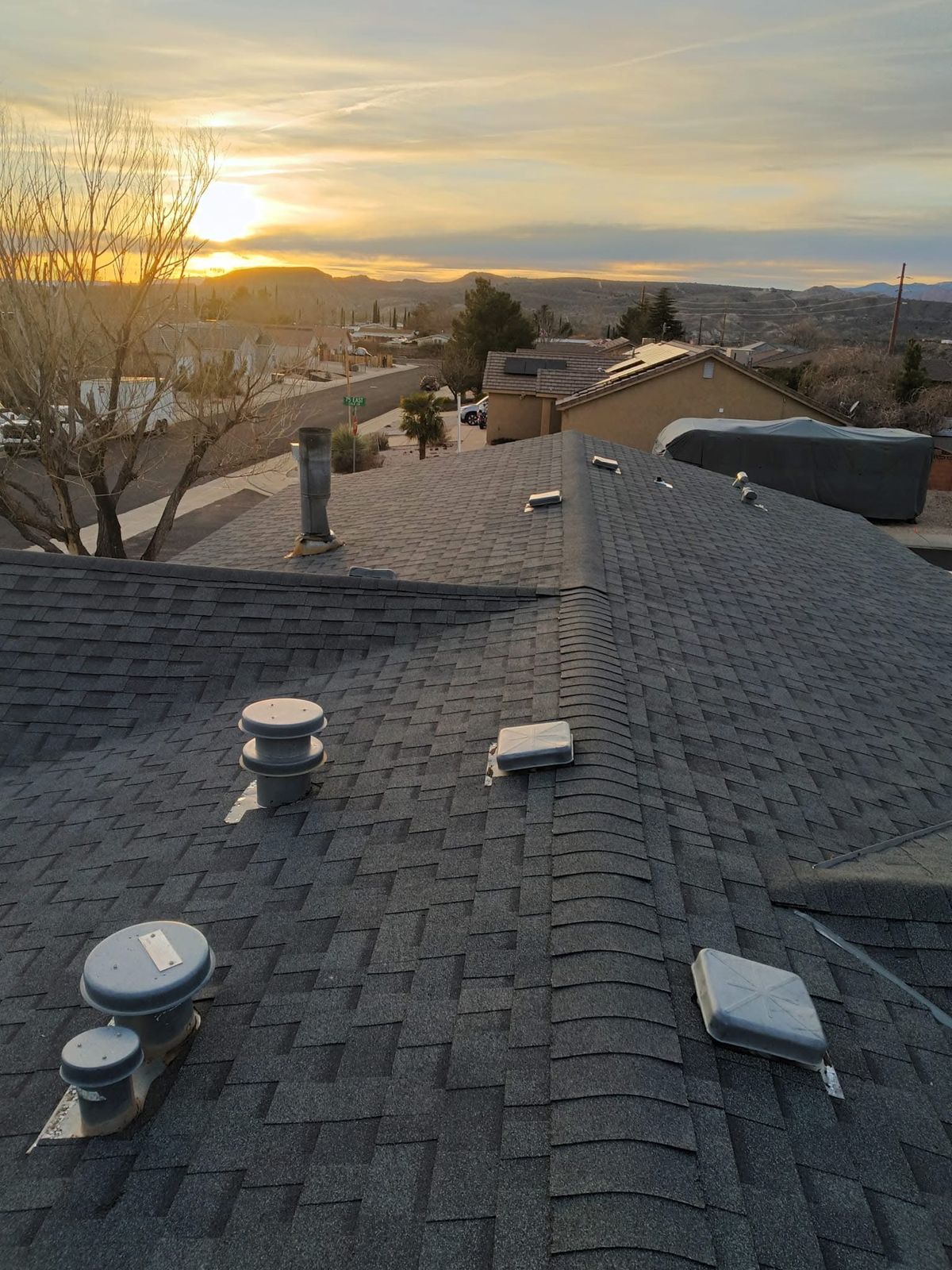 New dark gray architectural shingle roof we installed